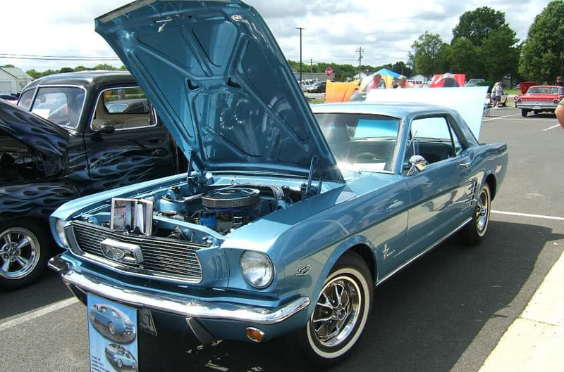 Blue Mustang with hood up 